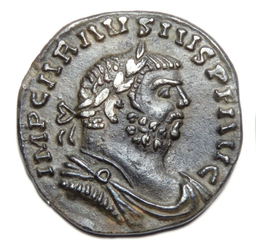 Lot 208: Carausius denarius, AD 286-293. Silver, 3.15g. 19.5 mm. Laureate...