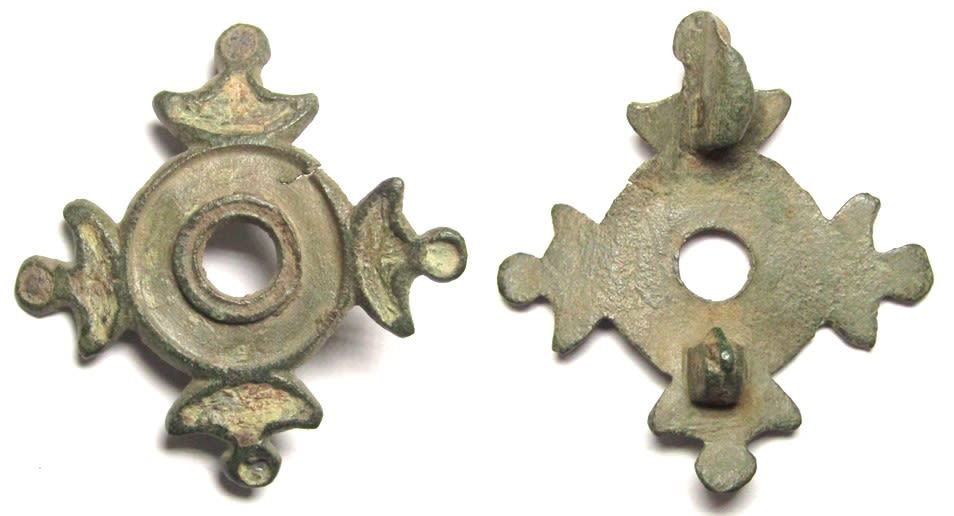 Lot 1016: Roman Plate Brooch. Circa 2nd-3rd century AD. Copper-alloy,...