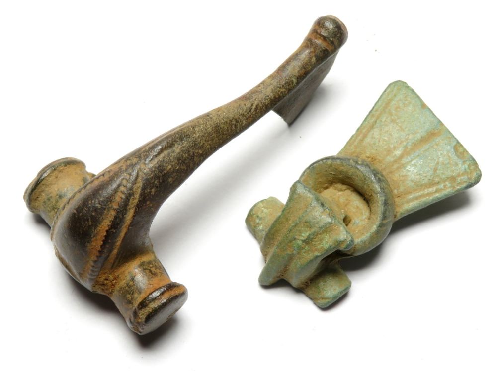 Lot 1042: Roman brooch pair. A Polden hill type and...
