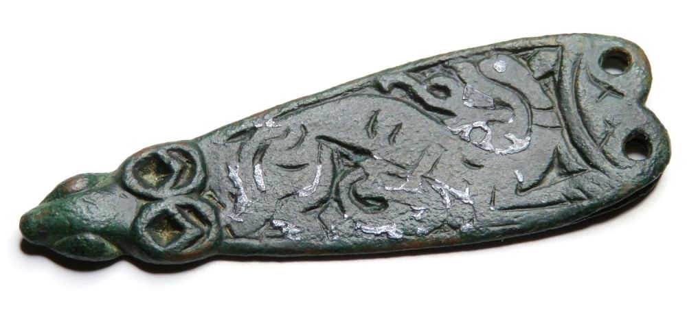 Lot 1044: Anglo-Saxon Zoomorphic Strap-end. Copper-alloy, 5.59g. 44.91 mm. A...
