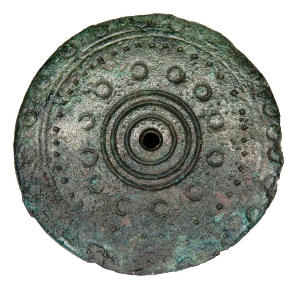 Lot 1047: Anglo-Saxon Disc Brooch. Circa 5th-6th century AD. Copper-alloy,...