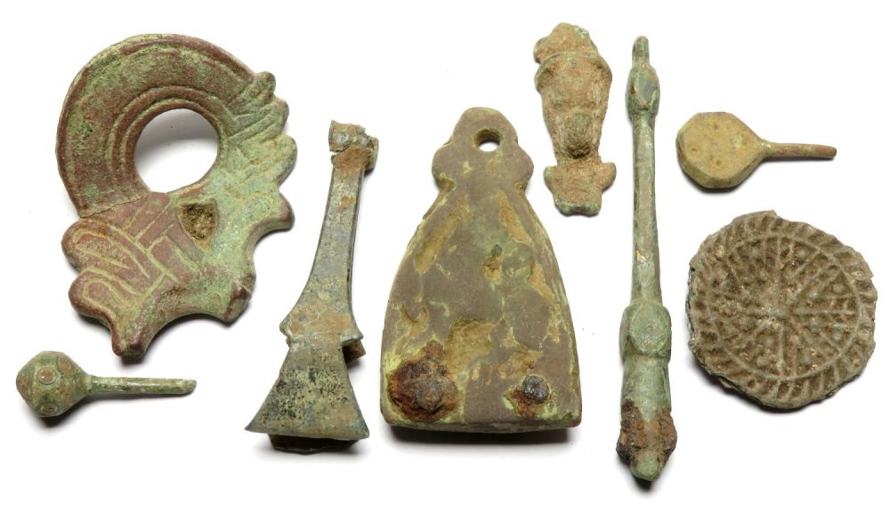 Lot 1054: Viking period artefact group including a stirrup mount,...