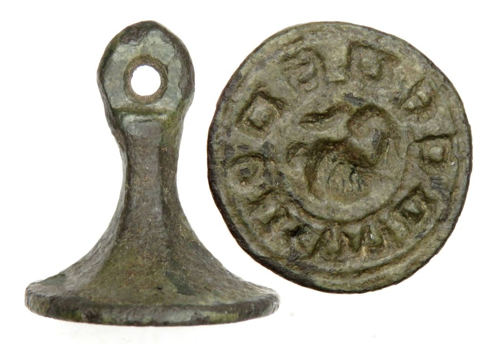 Lot 1055: Medieval Seal Matrix. Circa 14th century AD. Copper-alloy,...
