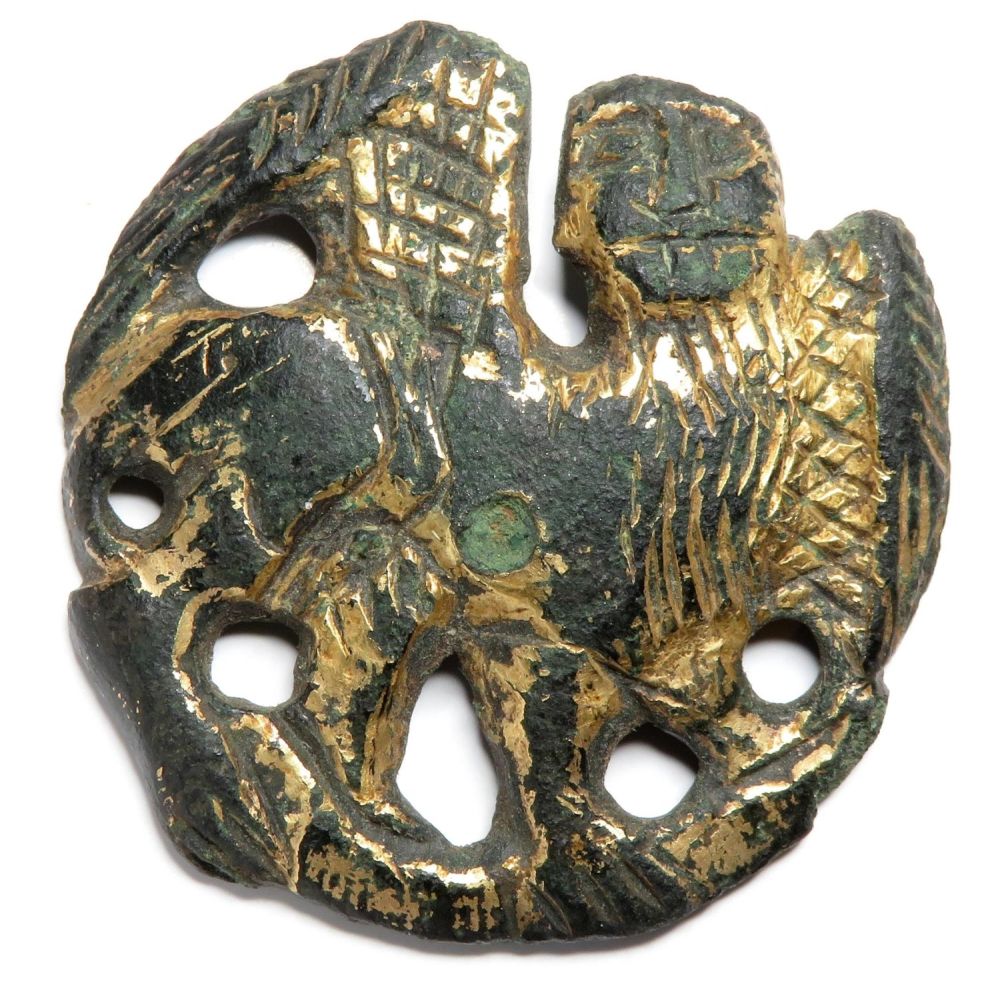Lot 1057: Medieval gilt bronze mount. Circa 13th-14th century AD....