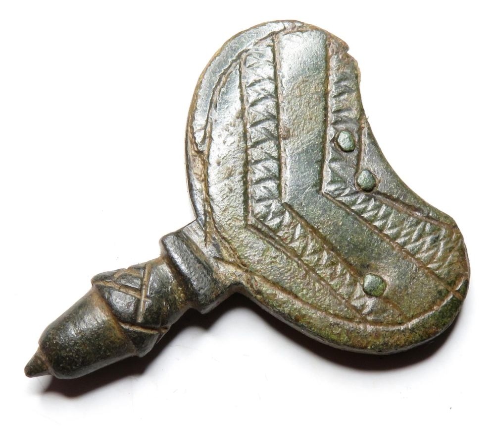 Lot 1058: Medieval Strap-end. Circa 13th-14th century AD. Copper-alloy, 9.43...