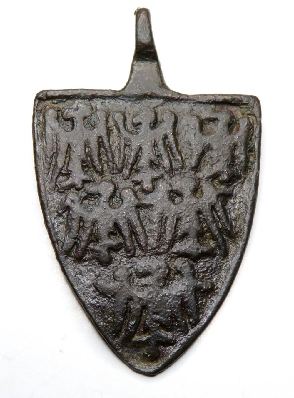 Lot 1064: Medieval heraldic harness pendant. Circa 13th century AD....