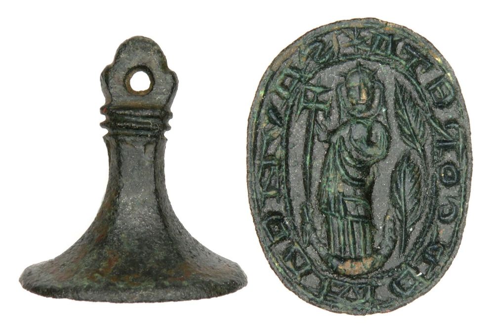 Lot 1065: Medieval Seal Matrix. Circa 14th century AD. Copper-alloy,...