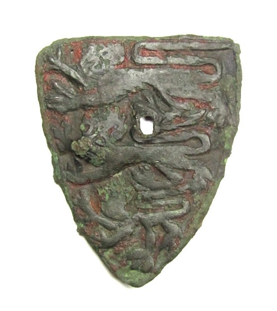 Lot 1068: Large Medieval Heraldic Mount. Copper-alloy, 30.57g. 67.86 x...