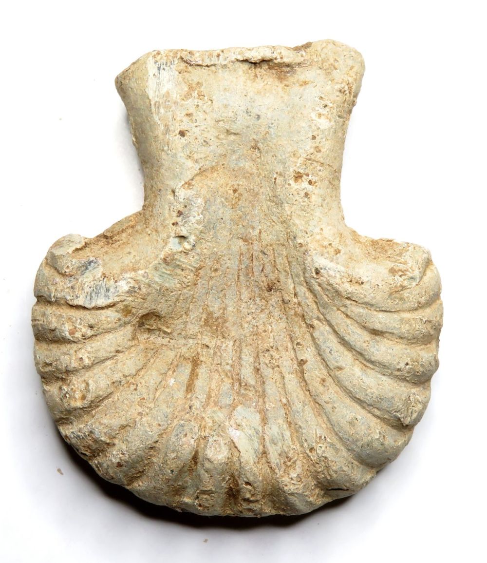 Lot 1072: Pilgrims ampulla. C. 14th century AD. Lead, 44mm...