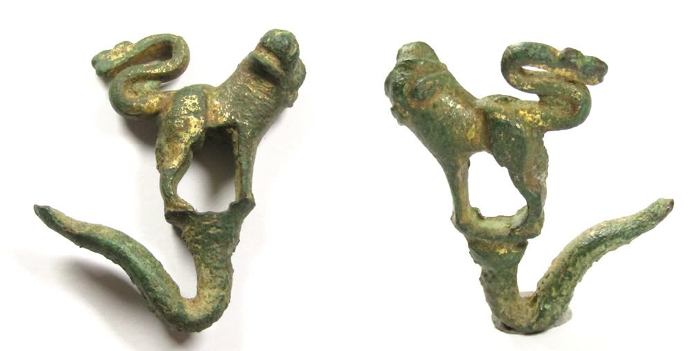 Lot 1077: Medieval Zoomorphic Mount. Circa 13th-14th century AD. Copper-alloy,...