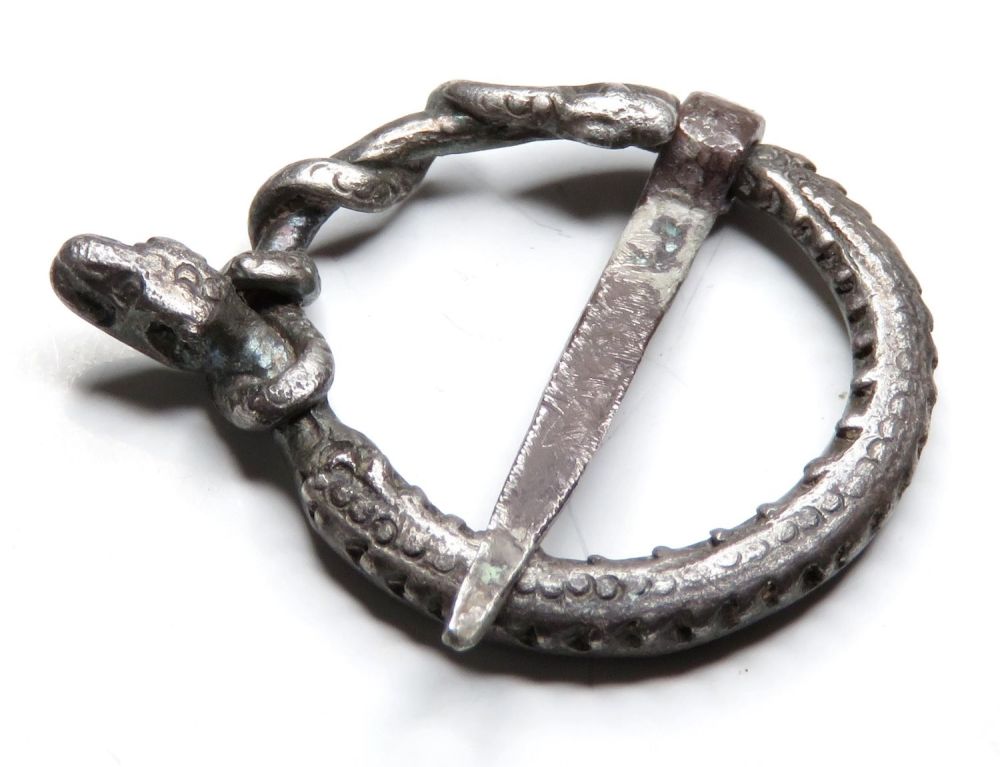 Lot 1088: Medieval Zoomorphic Annular Brooch. Circa 1200-1300 AD. Silver,...