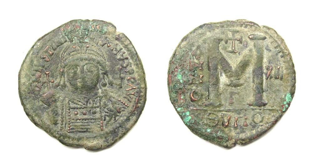 Lot 1115: Byzantine, Justinian I. Follis. Bronze, 23.69 g. 39.75...