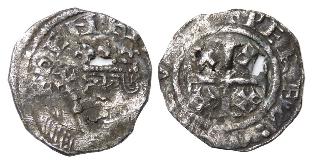 Lot 1176: Tealby penny, cracked. Class C. Obverse: crowned facing...