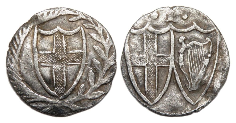 Lot 1253: Commonwealth Penny. Silver, 0.44g. 13.14 mm. Shield enclosing...