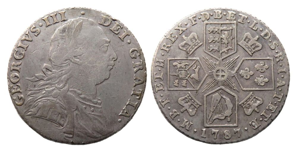 Lot 1267: George III Shilling. Laureate and draped bust right,...