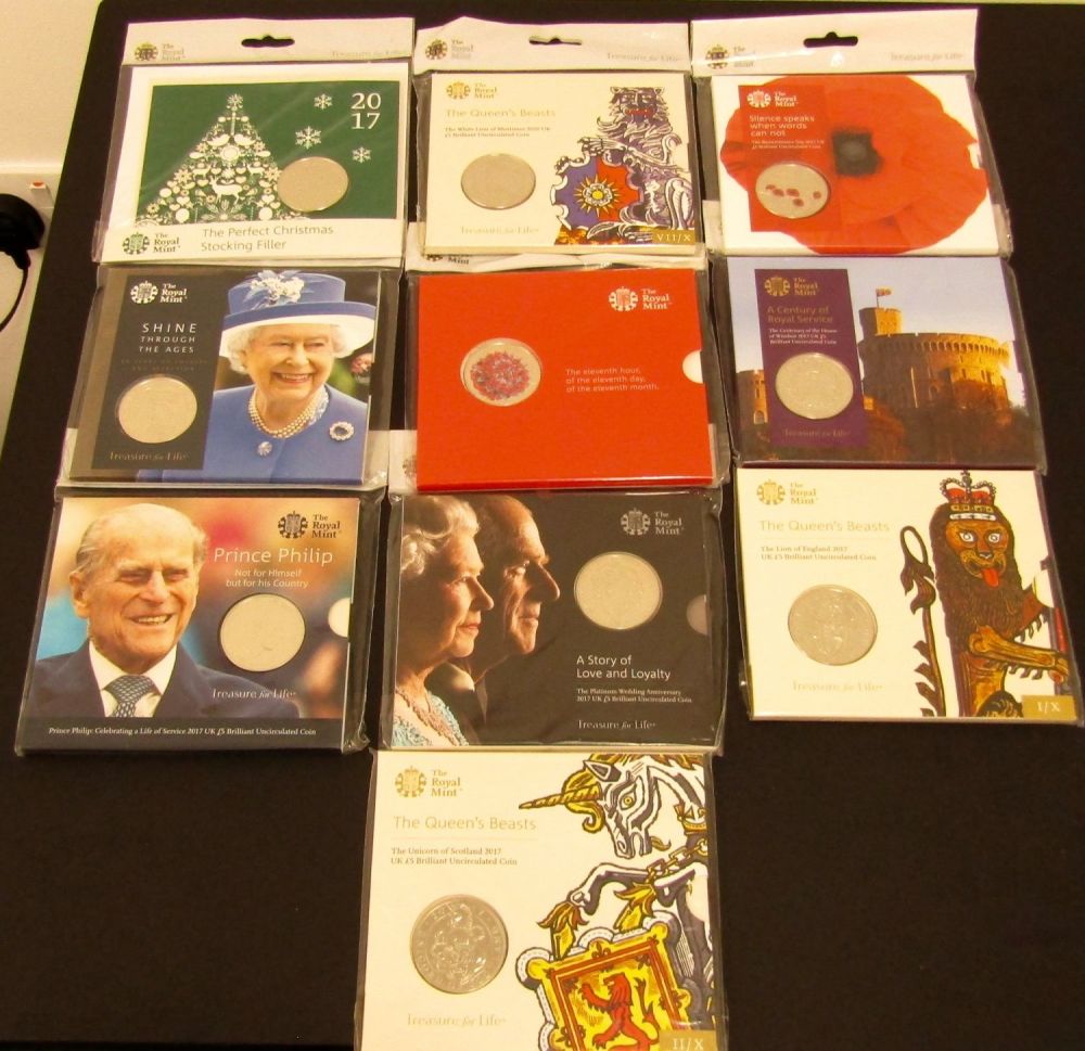 Lot 1304: Royal Mint BUNC Five Pounds in Presentation Packs...