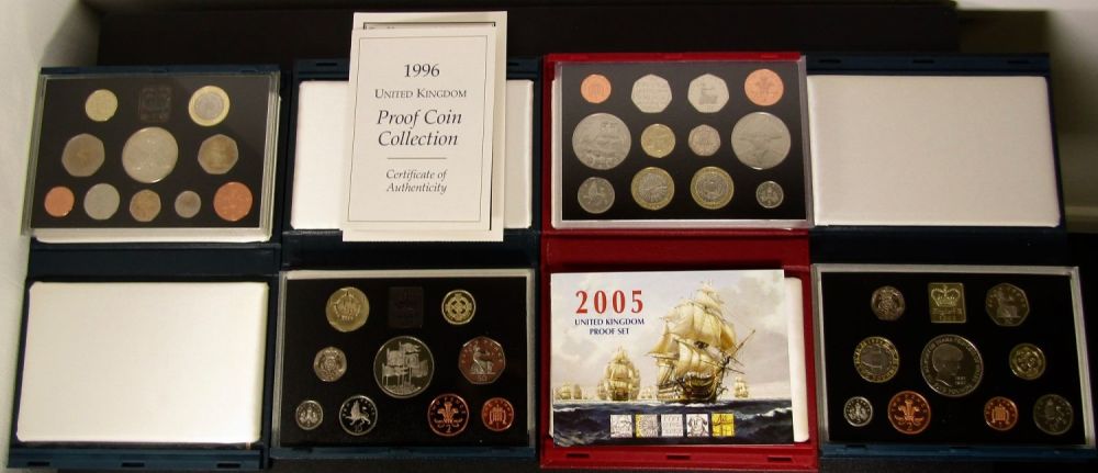 Lot 1329: Royal Mint Cased Proof Coin Year Sets (4)....