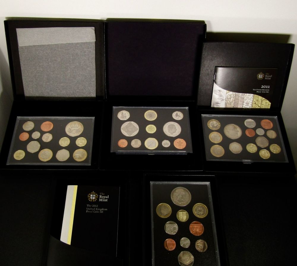 Lot 1330: Royal Mint Proof Boxed Coin Sets (4). 2008,...