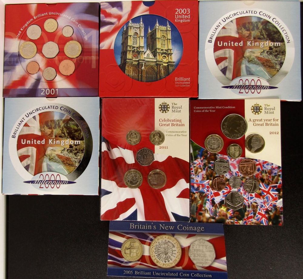 Lot 1337: Royal Mint BUNC Coin Sets in Presentation Packs...