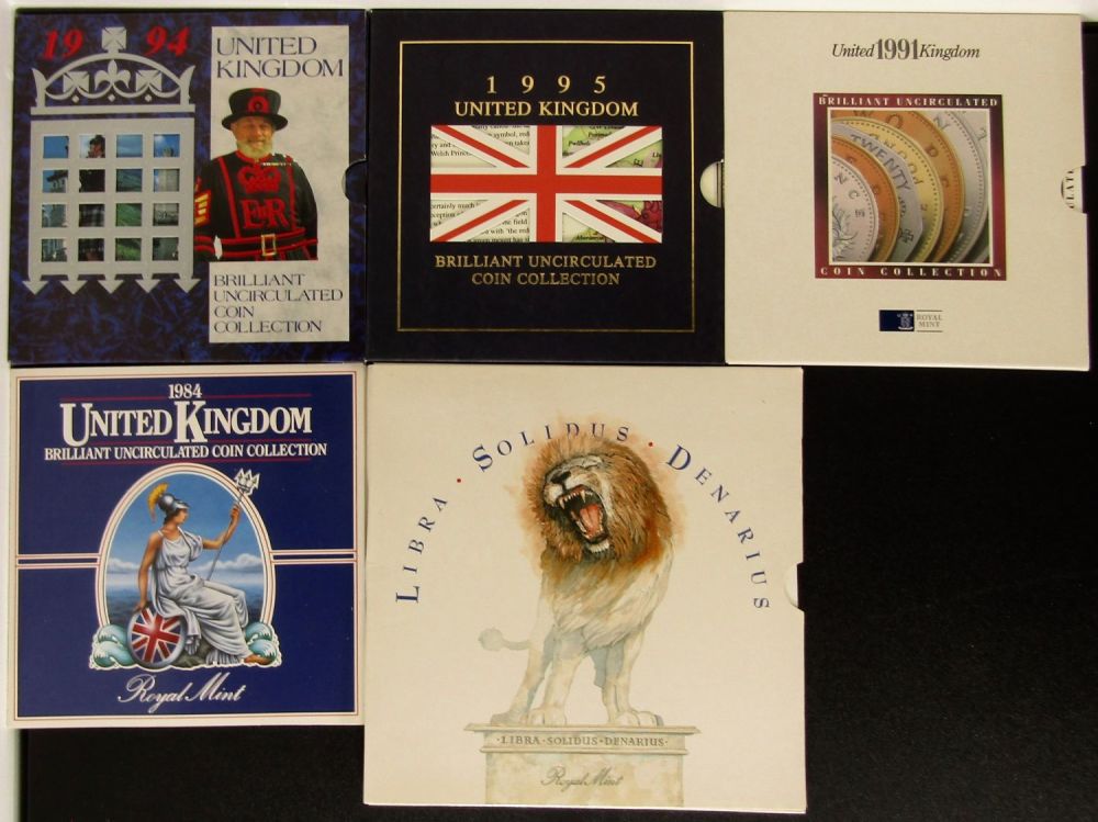 Lot 1338: Royal Mint BUNC Coin Sets in Presentation Packs...