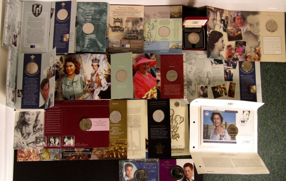 Lot 1342: Royal Mint Commemorative Crown Issues in Presentation Packs...