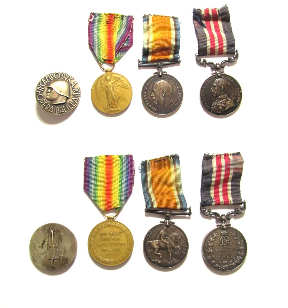 Lot 1352: Medal Trio and badge. An interesting group issued...