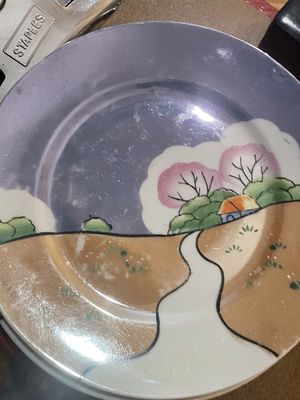 A Japanese Handpainted Lusterware Scenic Plate. A single ceramic luncheon plate, identified 