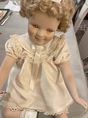 A Danbury Mint Little Miss Shirley Temple Toddler Doll. A collectible doll attributed to the 