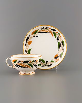 Чайная пара «Осень». ЛФЗ, 1923 год. 
Фарфор, надглазурная роспись, позолота. 
Высота чашки: 5,5 