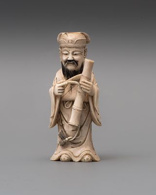 Фигура (окимоно) «Конфуций». Китай, 1920-1930-е годы. 
Слоновая кость, резьба, гравировка 