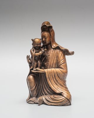 Фигура &laquo;Божество милосердия Гуаньинь с карако&raquo;. Китай, около 1900 года. 
Бронза, литьё 