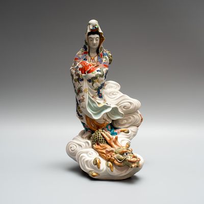 Фигура богини Каннон на драконе. Япония, 20 век. 
Фарфор, надглазурная роспись. 
Мастерские 