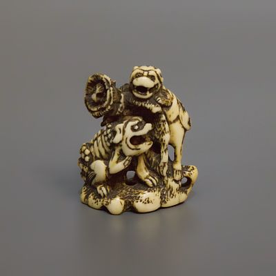 Нэцкэ &laquo;Два карасиси и пион&raquo;. Япония, 18 век. 
Кость, резьба. 
Высота: 4,8 см. 
Состояние: 