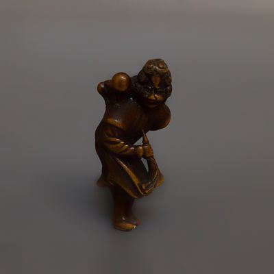 Нэцкэ &laquo;Иноземец с карако&raquo;. Япония, 18 век. 
Дерево, резьба. 
Высота: 8 см. 
Состояние: 