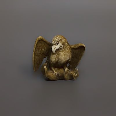 Нэцкэ &laquo;Орёл , поймавший лису&raquo;. Япония, начало 20 века. 
Кость, резьба. 
Высота: 5 см. 
