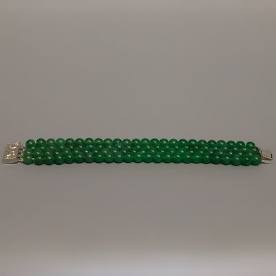Элегантный многорядный браслет из китайского нефрита. Китай, 20 век. 
4 нити: нефрит - круглые 