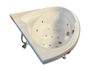 Roca Corner Whirlpool Bath. White Roca corner whirlpool bath with motors. The valve handle is