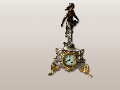 Clock with Seeder. Napoleon III pink marble, bronze sculpture "Female figure Sower" autonomy of