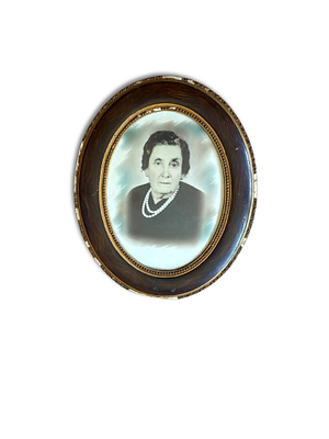 Oval Frame. Oval plaster frame with photo outline in Pau Santo (jacaranda) for wall application. 