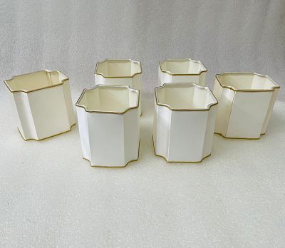 Set of Silk Shades
. Set comprising 6 lampshades in natural silk with gold detail for thin socket.