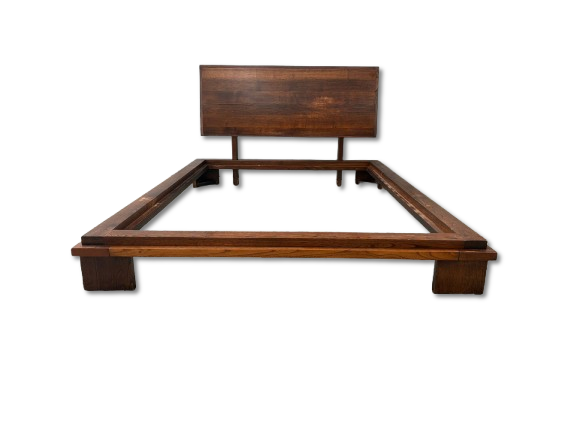 Brown Wooden Bed. Double bed in chestnut wood. Signs of use.
