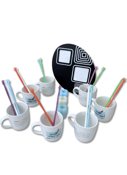 kitchen Objects. Set consisting of 7 ceramic mugs with different sayings, 10 straws for stirring 