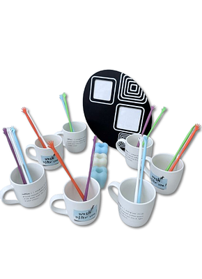 kitchen Objects. Set consisting of 7 ceramic mugs with different sayings, 10 straws for stirring 
