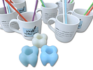 kitchen Objects. Set consisting of 7 ceramic mugs with different sayings, 10 straws for stirring Image - 1
