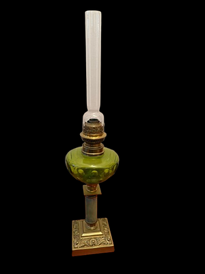 Oil Lamp. Bronze 
relief decoration, glass tank and globe, marble detail. 
French. 
