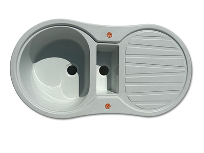 Kitchen Counter. Kitchen counter with a round sink, a rectangular sink in the center and a white 