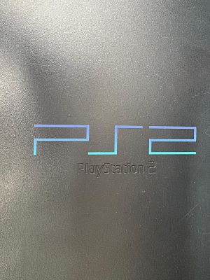 Playstation 2 console with cables. Signs of use.