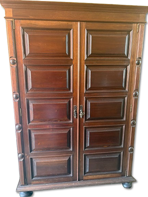 Cabinet. Wooden sideboard with two doors. Interior with shelf. Signs of use.