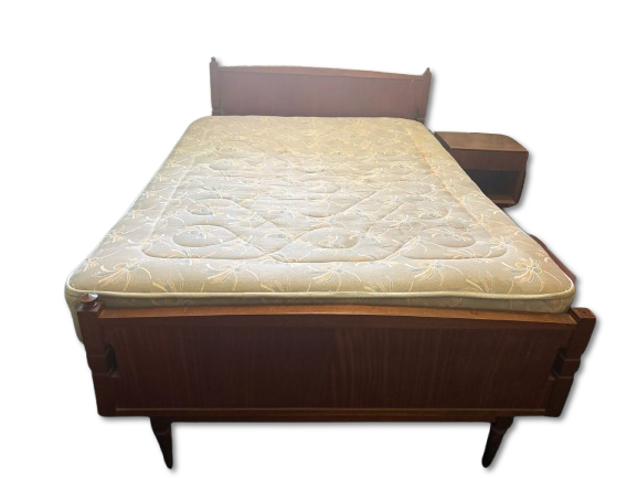 Bed with Bedside Table. Single mahogany bed with vintage nightstand. The bed has some broken 