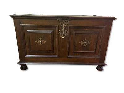 Wood Storage. Wooden storage chest with metal hardware. Signs of use.